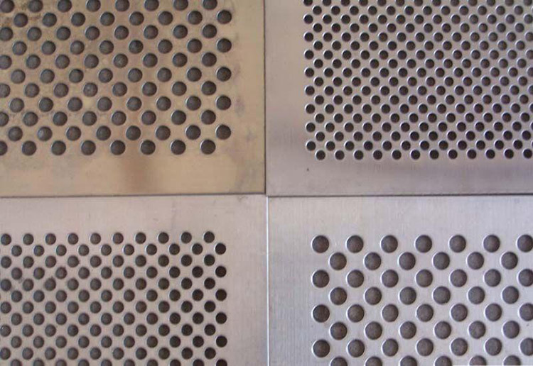 a picture of hammer mill sieve with different diameters