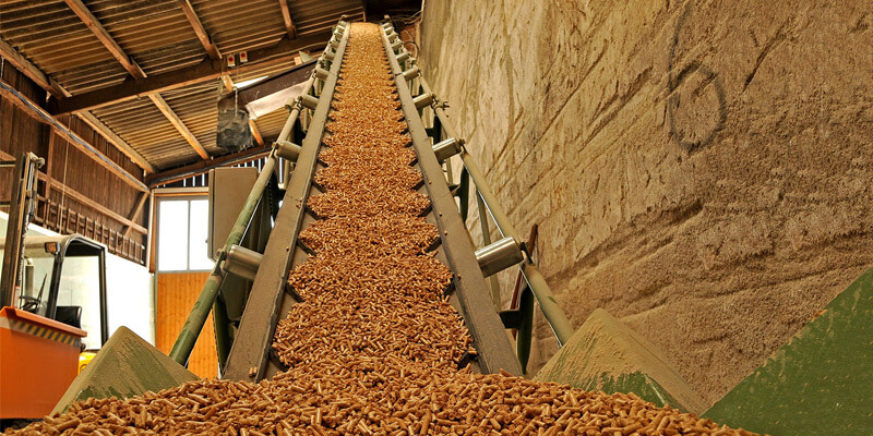 a picture of wood pellet production process